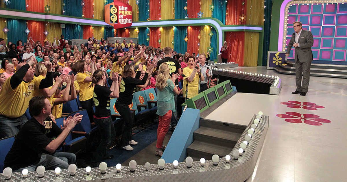 Drew Carey on "The Price Is Right" set in Los Angeles, California (Cover image source: Getty Images| Photo by Frederick M. Brown)
