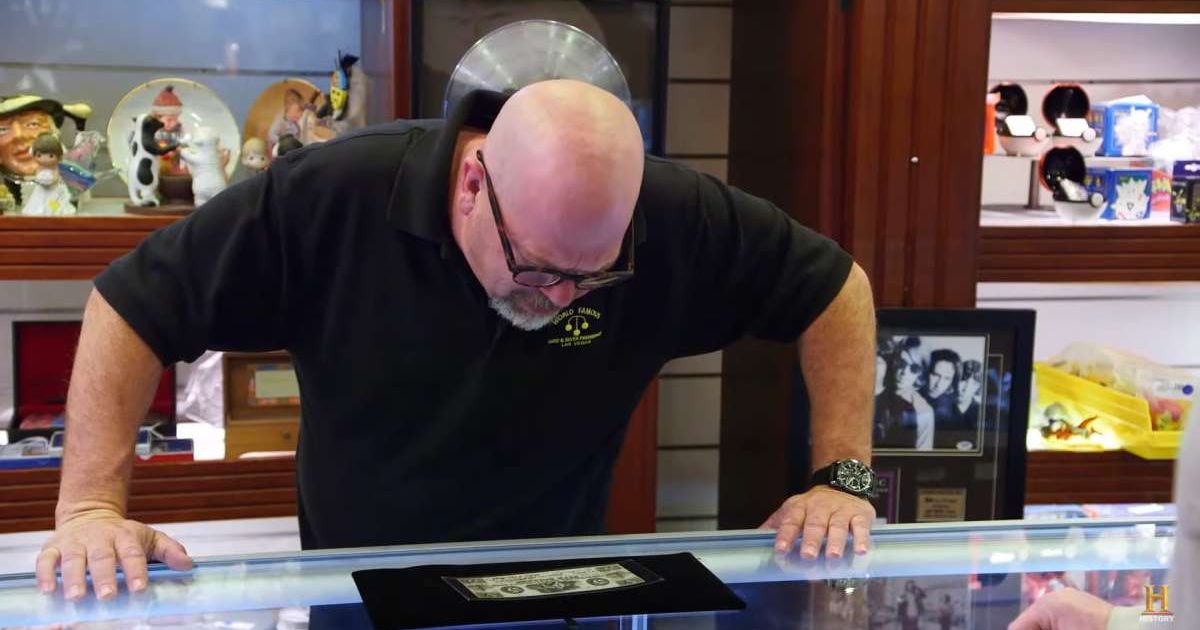Screenshot showing Rick Harrison looking at the rare Mormon Bank Note (Cover image source: YouTube/Pawn Stars)