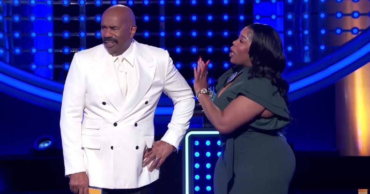 Screenshot showing Steve Harvey and the contestant on "Family Feud." (Cover Image Source: YouTube | Family Feud)