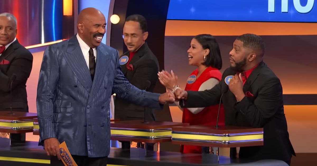 Screenshots showing Steve Harvey fist bumping a contestant (Cover image source: YouTube/Family Feud)