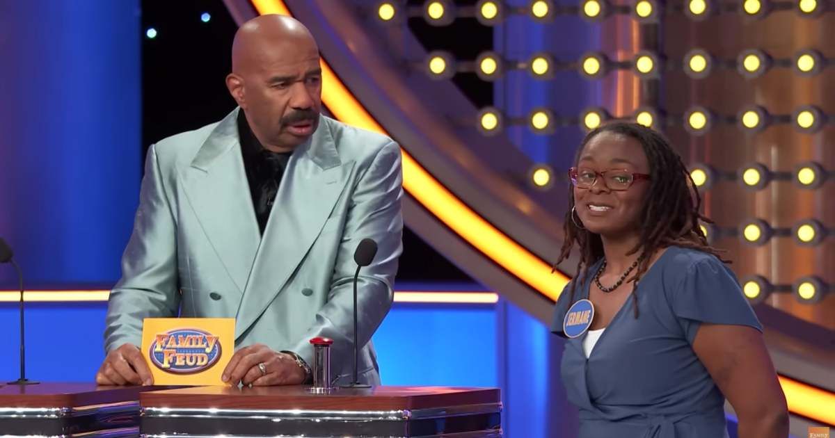 Screenshot showing Steve Harvey and the contestant on "Family Feud." (Cover Image Source: YouTube | Family Feud)