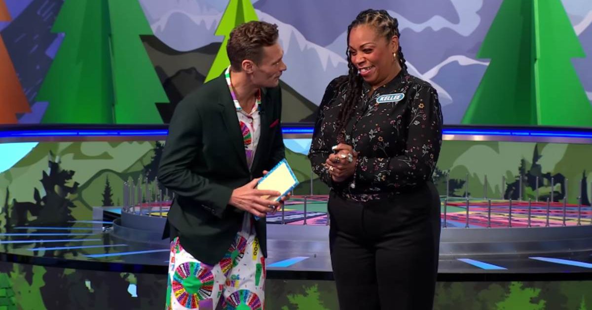 The player with Seacrest after failing to solve the puzzle (Cover image source: YouTube | Wheel of Fortune)