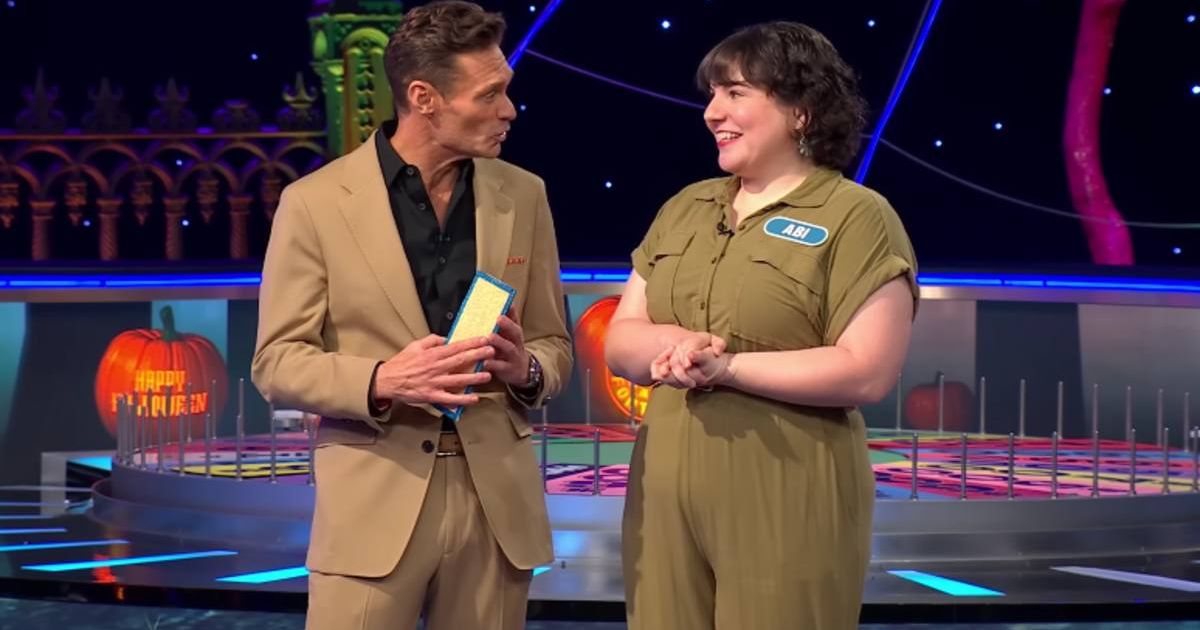 The contestant Abi with Ryan Seacrest at the end of her game (Cover image source: YouTube | Jeopardy)