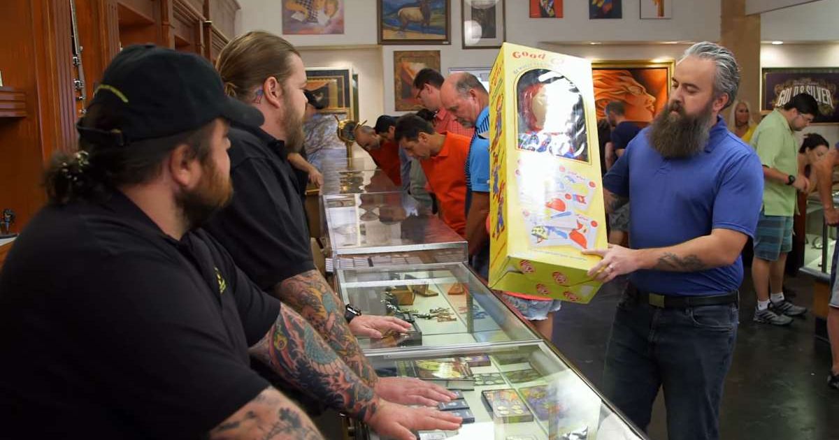 Screenshot showing the seller placing 'Chucky' on the table (Cover image source: YouTube/Pawn Stars)