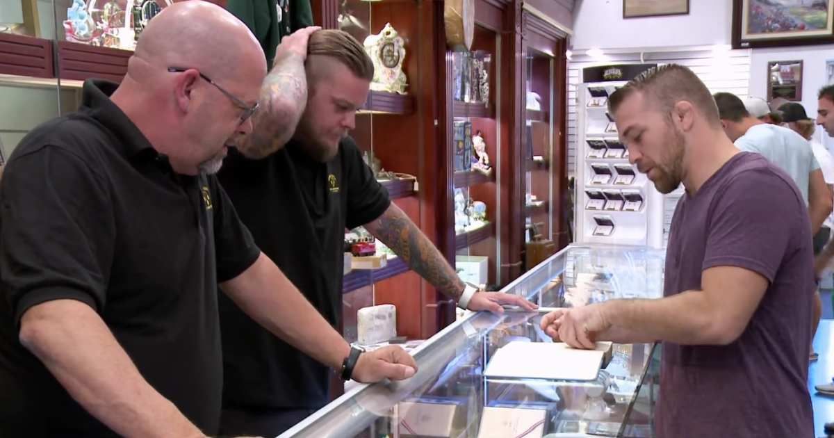 Screenshot showing the guest, Rick Harrison, and Corey Harrison on "Pawn Stars" (Cover image source: YouTube | Pawn Stars)