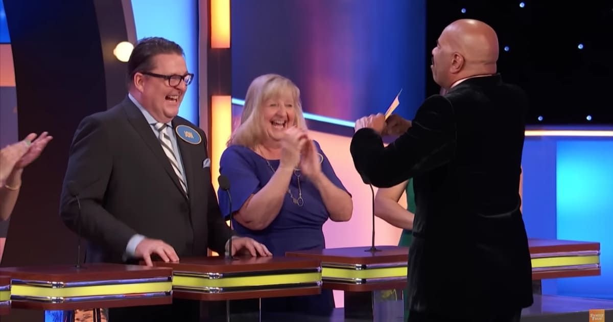 Screenshot showing Steve Harvey dancing in front of the contestant (Cover image source: YouTube | Family Feud)