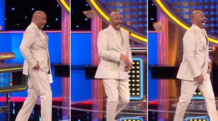 'Family Feud' host Steve Harvey throws his cards and almost trips after hearing a wild answer