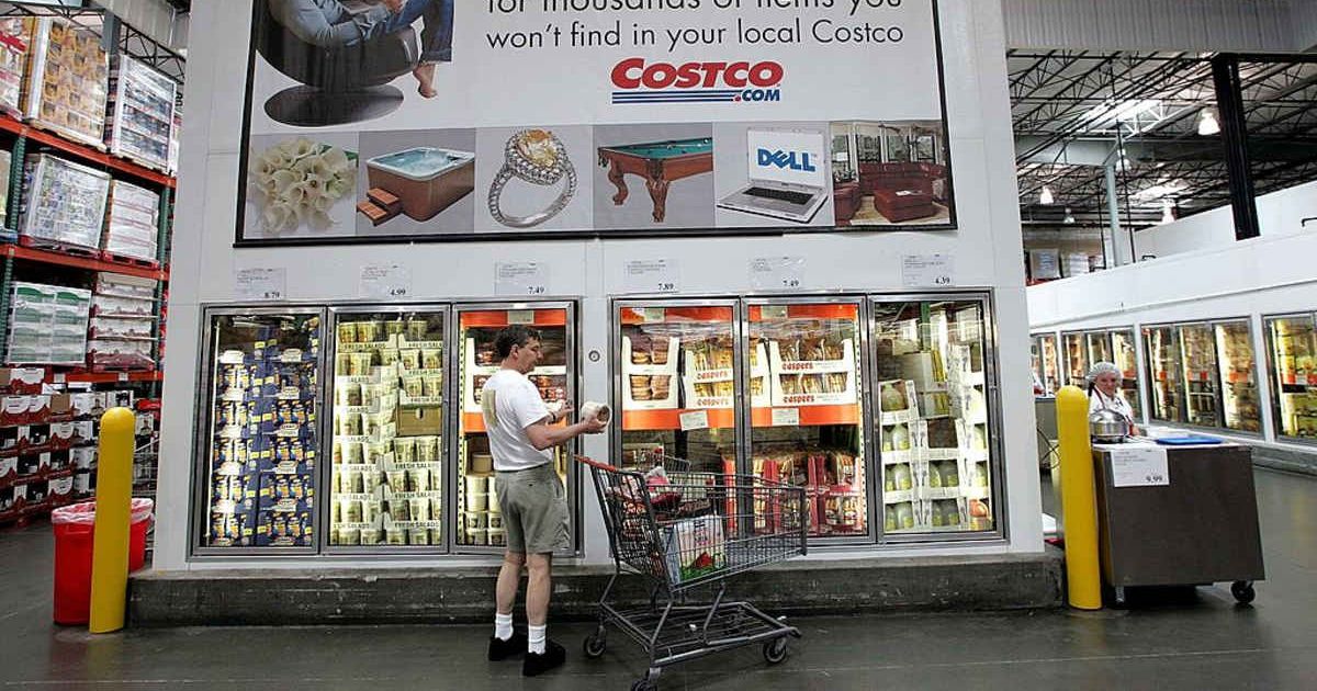 Representational image shows man with a shopping cart looking at frozen food products at Costco (Cover image source: Getty Images | Justin Sullivan)