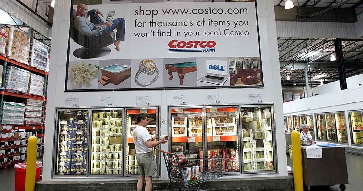 Image of a shopper inside a Costco store. (Cover image source: Getty Images | Justin Sullivan)
