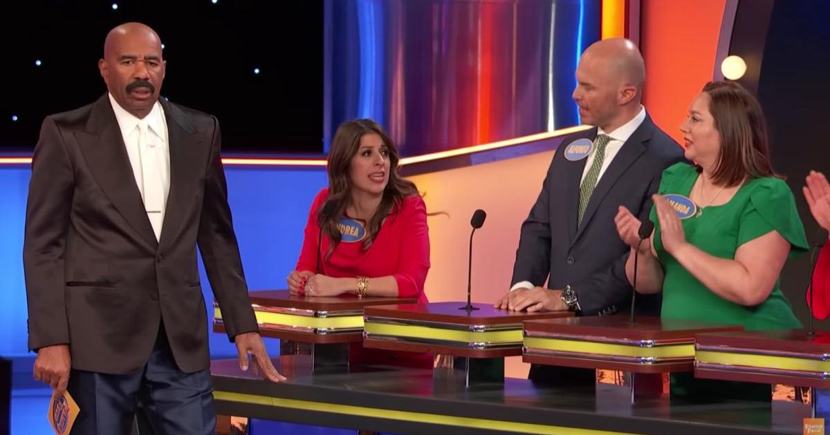 Screenshot showing Steve Harvey with the contestants on "Family Feud" (Cover Image Source: YouTube | Family Feud)