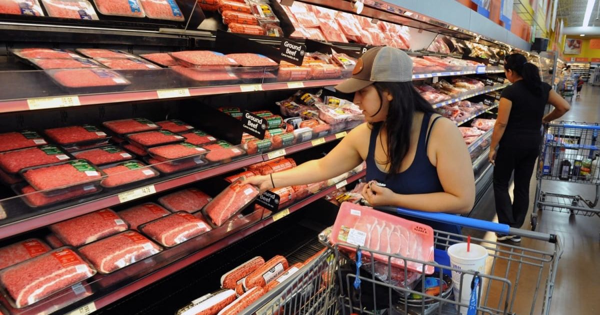 Representative image of a shopper buying meat from Walmart (Cover Image Source: Getty Images | Photo by Bob Riha, Jr.)