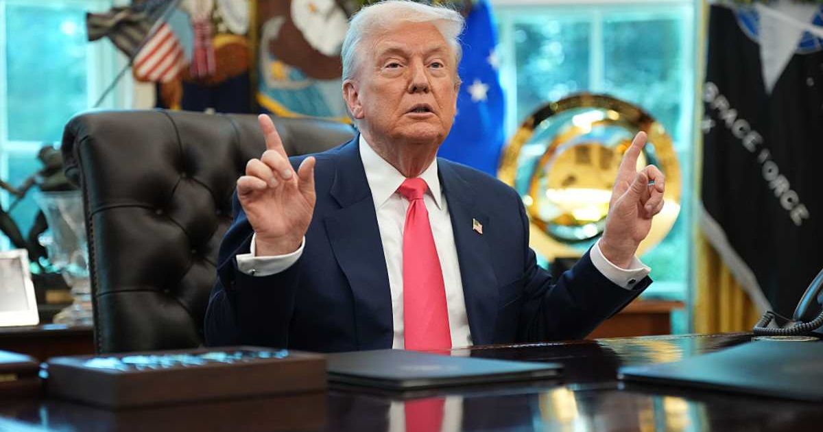 U.S. President Donald Trump answers questions from reporters in the Oval Office (Image source: Getty Images/Photo by Andrew Harnik)