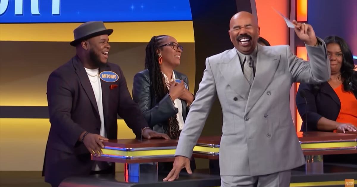 Screenshot showing Steve Harvey cracking up (Cover image source: YouTube/Family Feud)