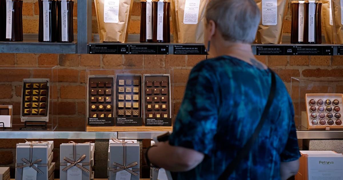 Representative image of a shopper looking at chocolates (Cover Image Source: Getty Images | Photo by Justin Sullivan)