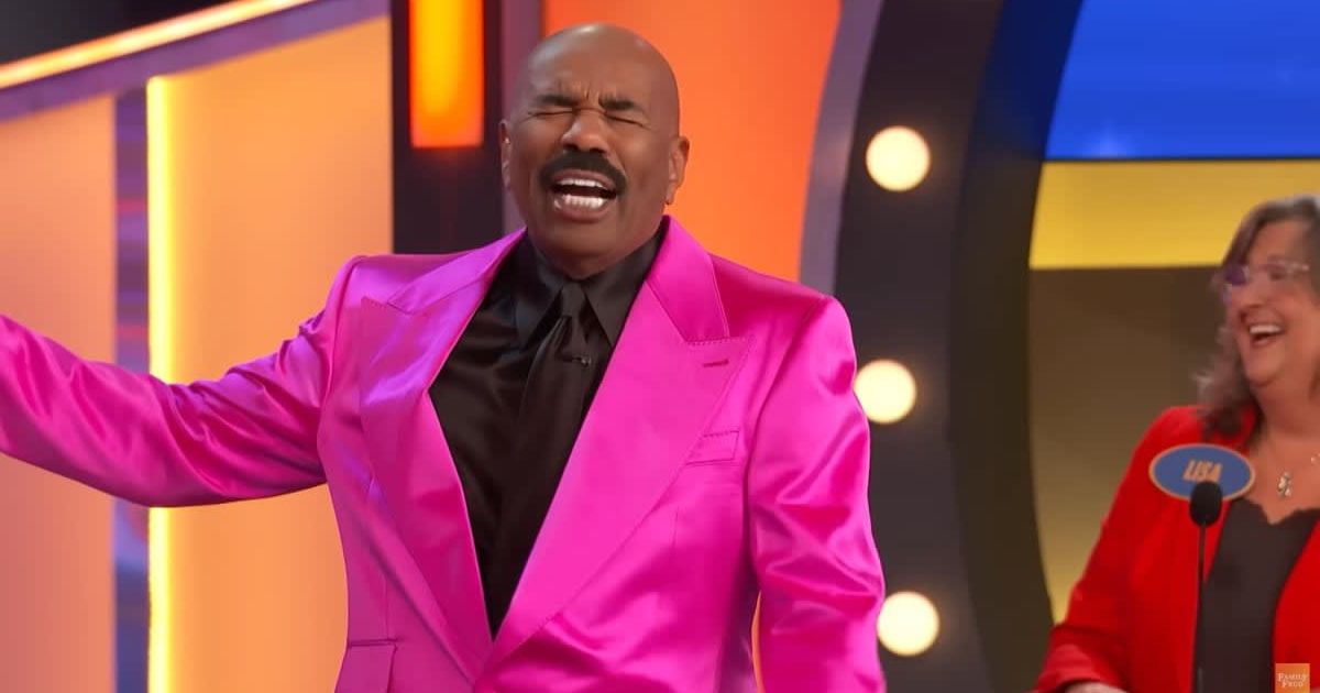 Screenshot showing Steve Harvey having fun (Cover image source: YouTube/Family Feud)