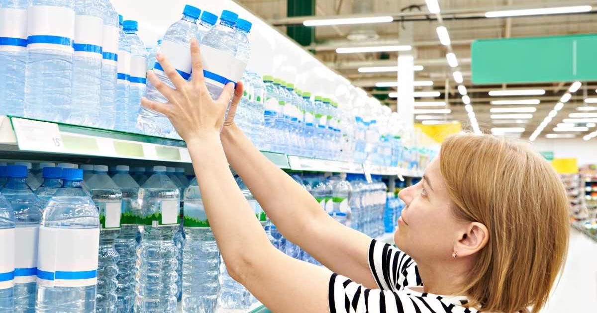 Representative image of a woman buying water. (Cover Image Source: Getty Images| Photo by sergeyryzhov)