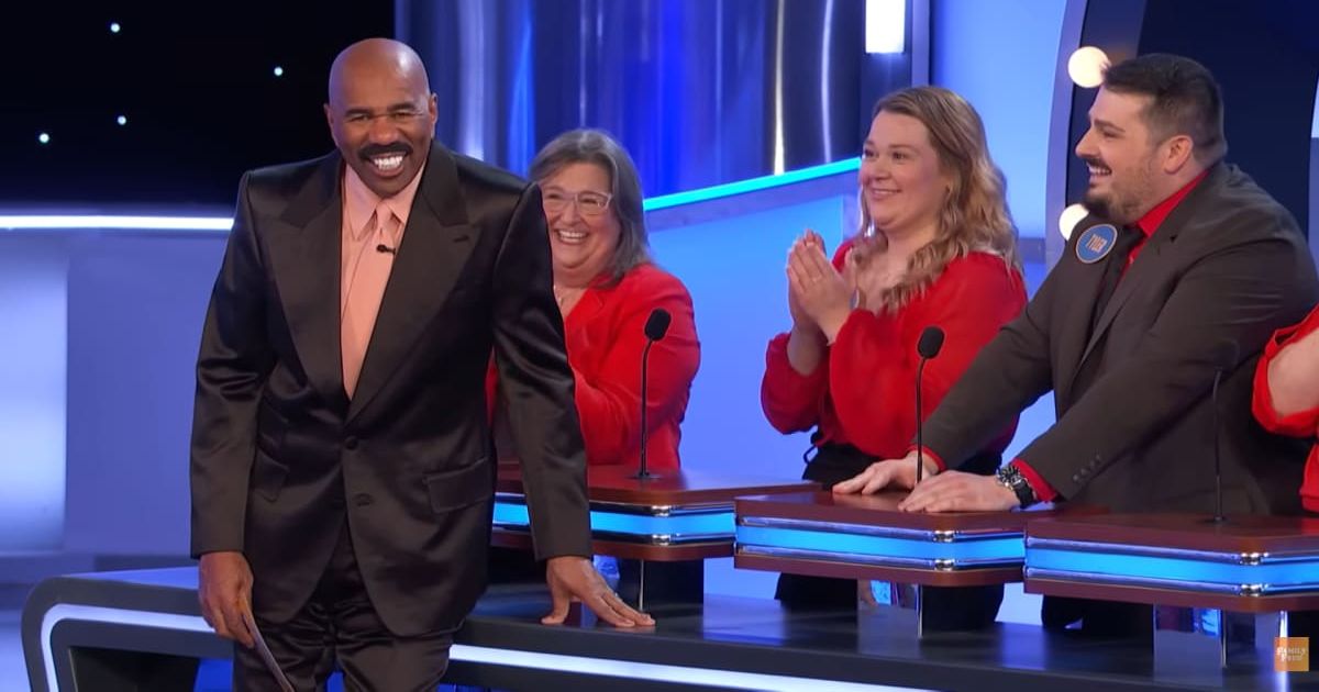 Screenshot showing Harvey laughing at the player's answer (Cover image source: YouTube/Family Feud)