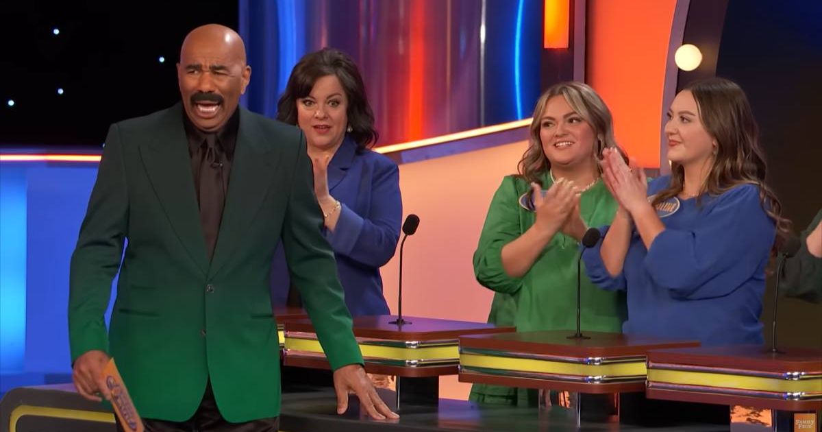 Screenshot showing Harvey laughing at the answer (Cover image source: YouTube/Family Feud)