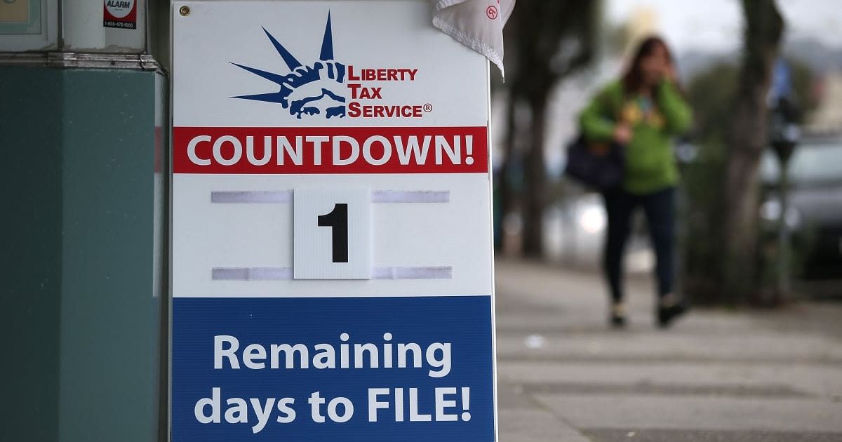 A sign advertising one day remaining before the tax filing deadline (Getty Images | Photo by Justin Sullivan)