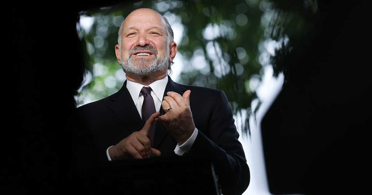 U.S. Commerce Secretary Howard Lutnick answers questions during a television interview at the White House (Cover image source: Getty Images/Photo by Win McNamee)