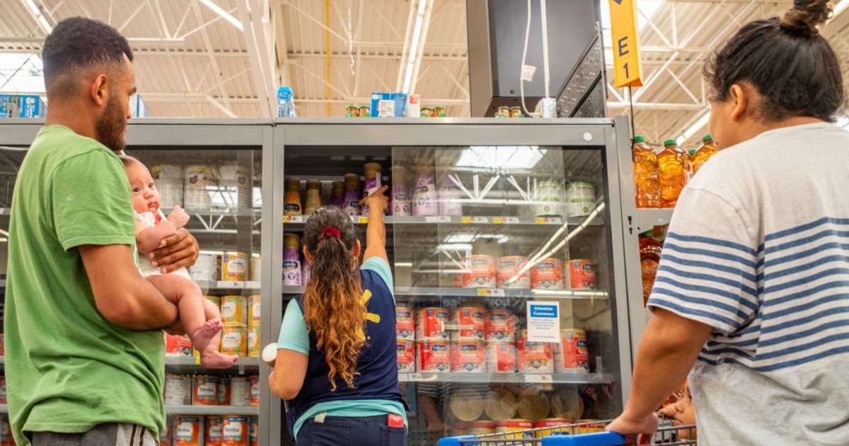 Representative image of a couple shopping with their child. (Cover image source: Getty Images | Brandon Bell)