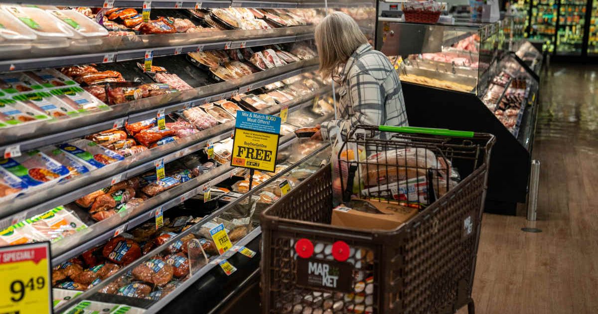 Representative image of a shopper browsing through meat products. (Cover Image Source: Getty Images | Photo by Robert Nickelsberg)