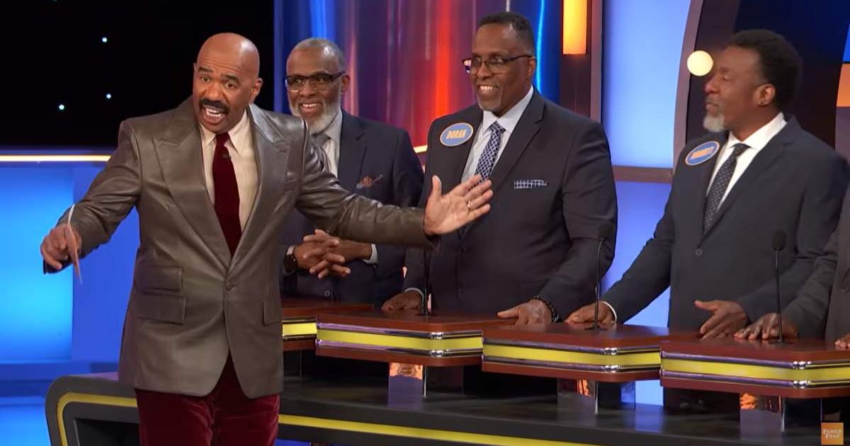 Screenshot showing Steve Harvey talking to Amret (Cover image source: YouTube/Family Feud)