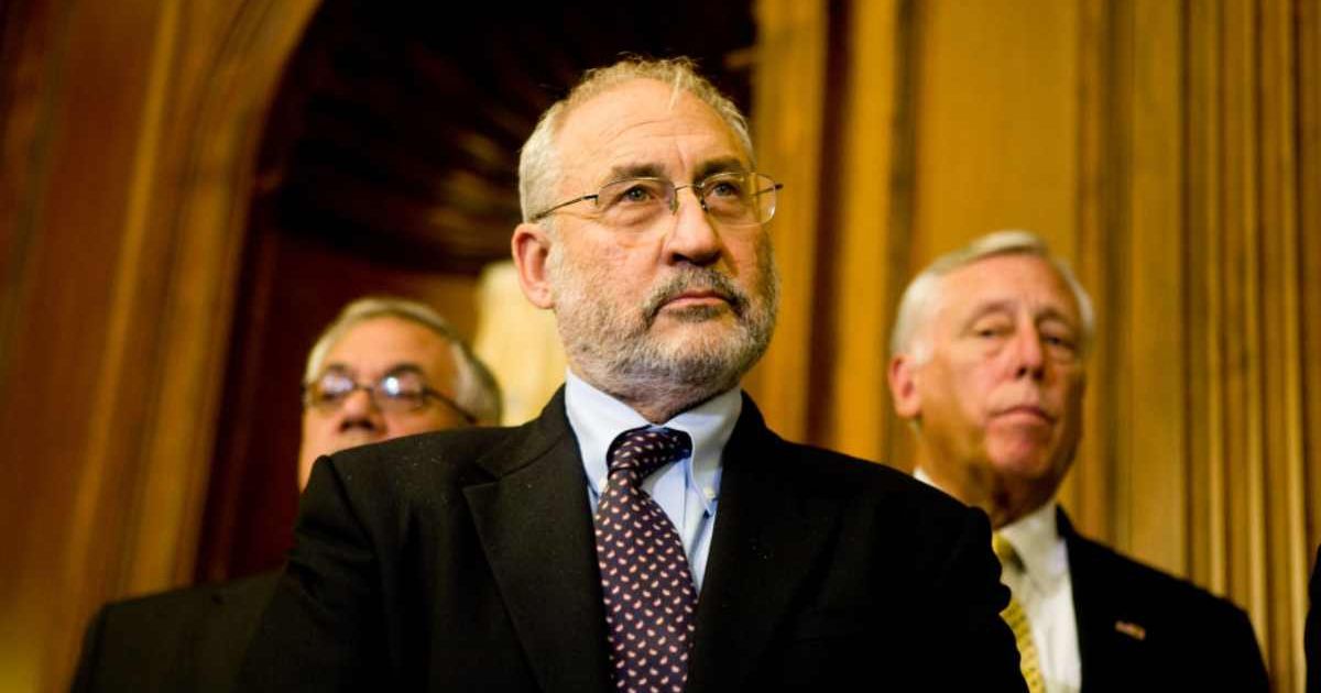 Nobel Prize-winning economist Joseph Stiglitz listens during a news conference with House Democrats (Cover image source: Getty Images/Photo by Brendan Hoffman)