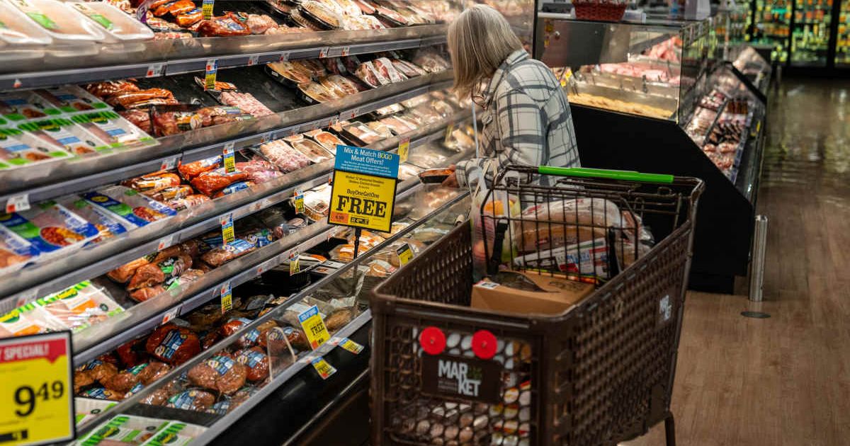 Representative image of a shopper browsing through meat products. (Cover Image Source: Getty Images | Photo by Robert Nickelsberg)