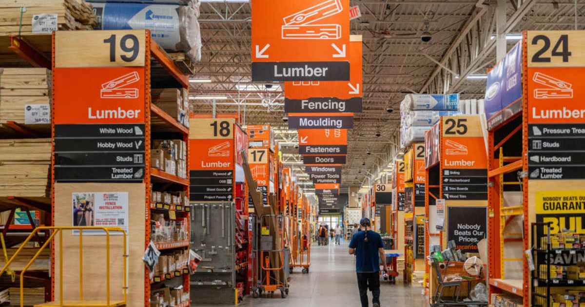 Representative image of a customer walking through The Home Depot store (Cover image source: Getty Images/Photo by Brandon Bell)