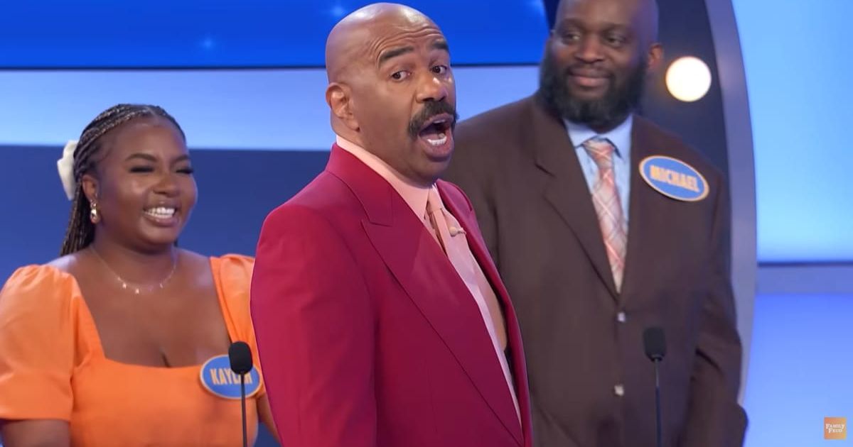 Screenshot showing Harvey's reaction to one of the answers (Cover image source: YouTube/Family Feud)